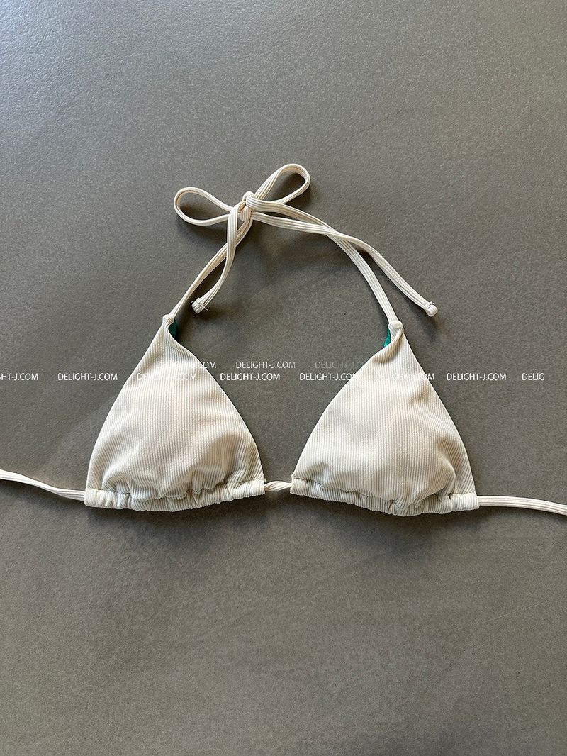 a set of 2 layered colored bikinis