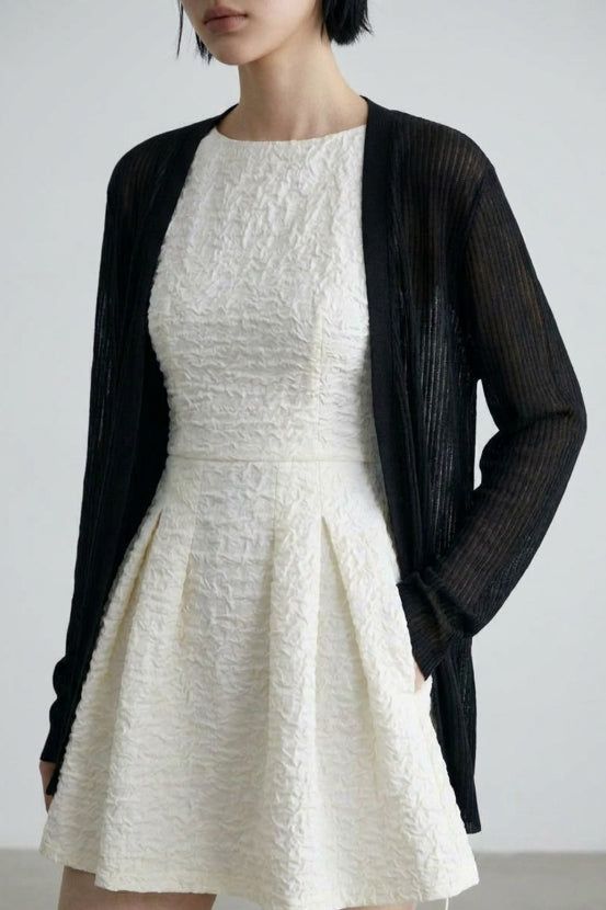 EEUN（イウン）の「Honey Sheer Cardigan（Tops）」