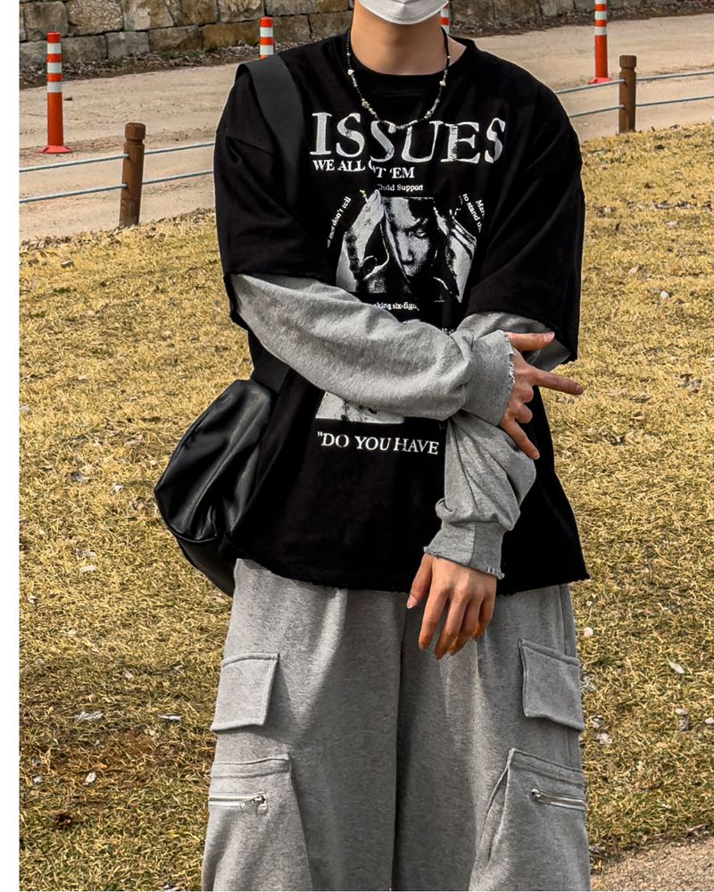 JIIGEUM(ジグム)の「Issue Layered Color-Blocked Oversized Long Sleeve(Tops)」