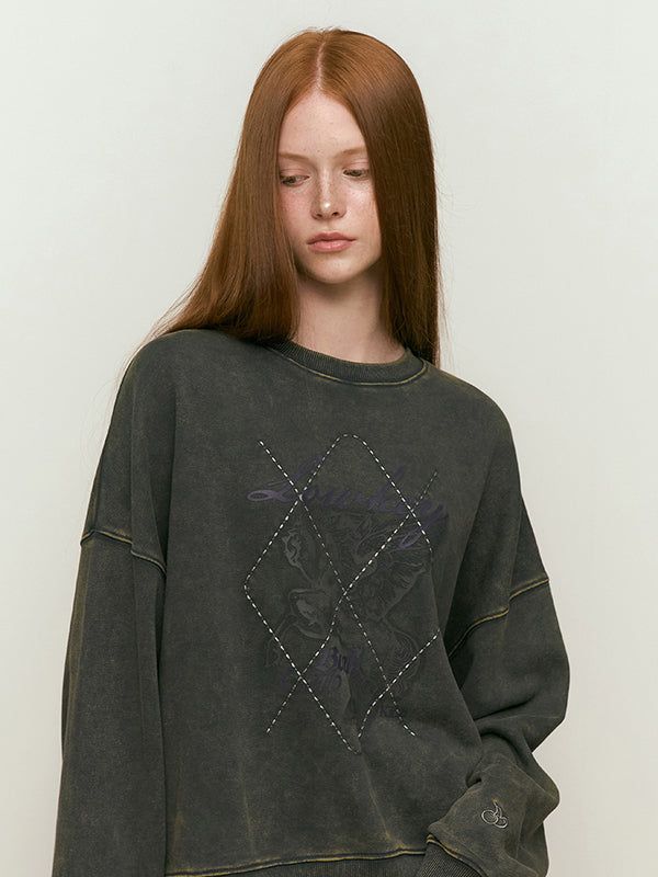 KIRSH（キルシー）の「LUNA WASHING UNICORN GRAPHIC SWEATSHIRT [DARK CHARCOAL]（Tops）」