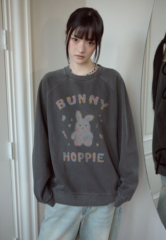CPGN studio（コンパーニョ）の「Pastel Bunny Raglan Pigment Sweatshirt（Tops）」