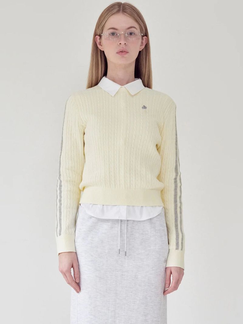 KIRSH（キルシー）の「KIRSH PLAIN LINE POINT CABLE KNIT - IVORY  （Tops）」