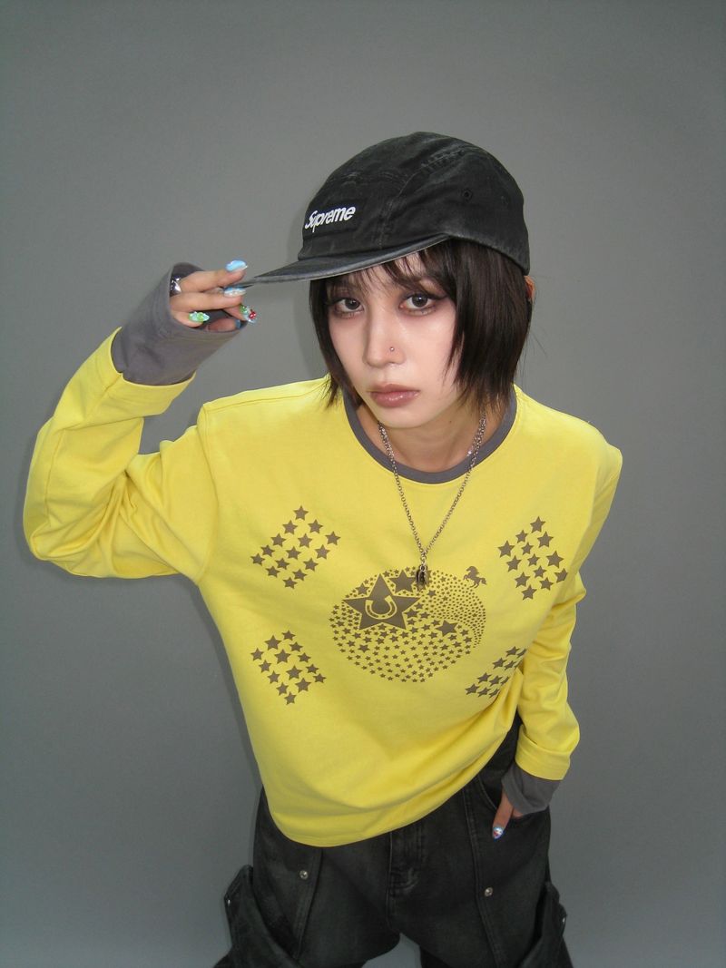 STEKI YOUTH（ステキユース）の「i ♥ Korea 長袖Tシャツ [Yellow]（トップス）」