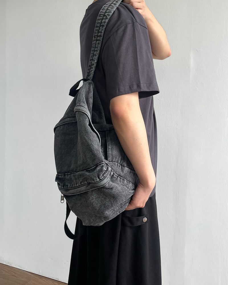 Washed denim backpack