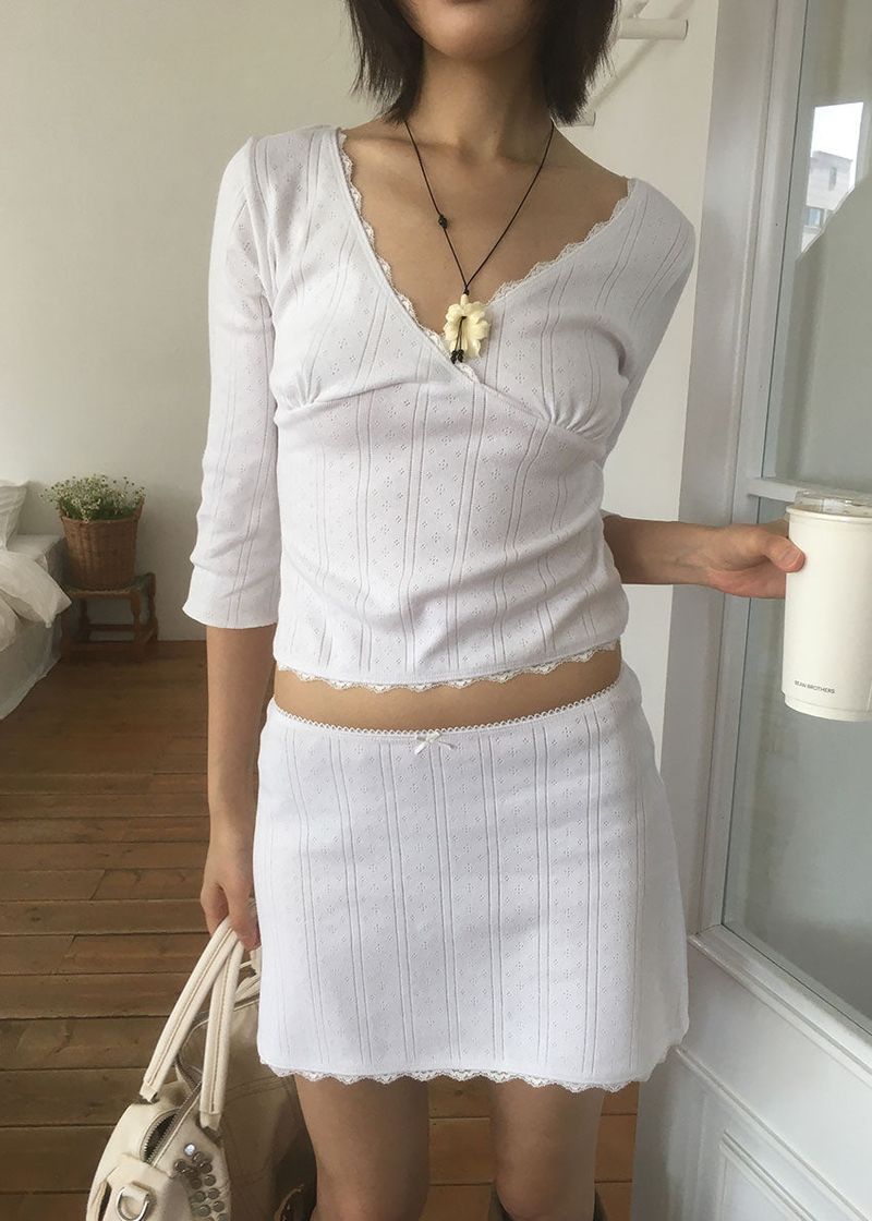 PINTER PUNCHING MINI SKIRT (2color)