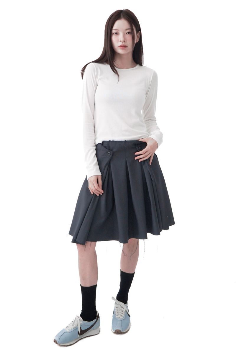  UNTAMED PLEATS SKIRT