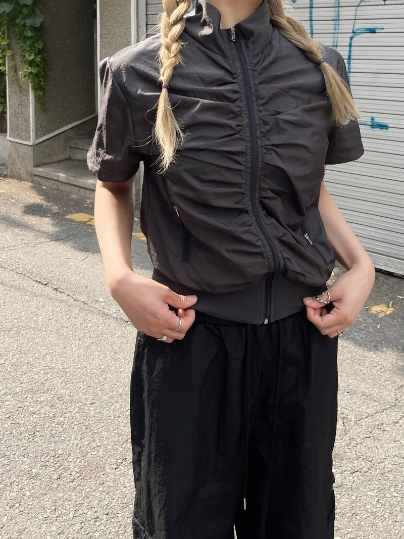 heenytsuki（ヒニツキ）の「Wind high neck shirring short-sleeved jumper（Jackets/Outerwear）」