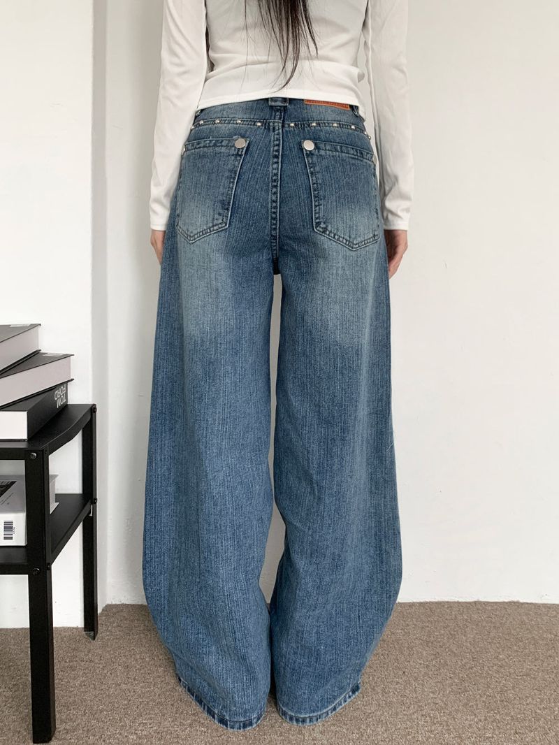 Rivet eyelet punching washed wide denim pants (Denim)
