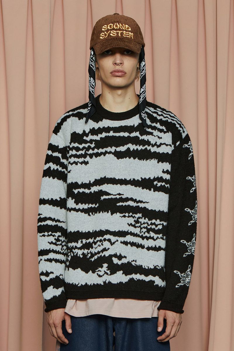 UNALLOYED(アナロイド)の「NOTE STAR KNIT / BLACK(Tops)」
