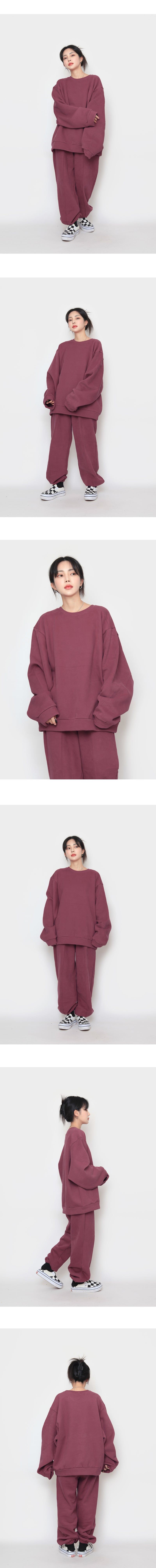 wool over peach sweatshirt