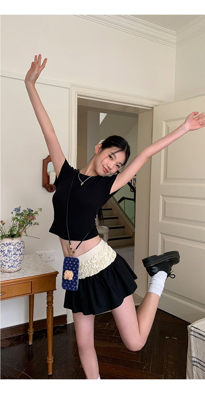 dereborujo（ドレボルゾー）の「Black padded back strap short sleeve tee（Tops）」