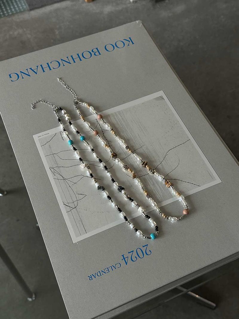 ASCLO（エジュクロ）の「ASCLO Smile & Skull Beads Necklace (2color)（Accessories）」