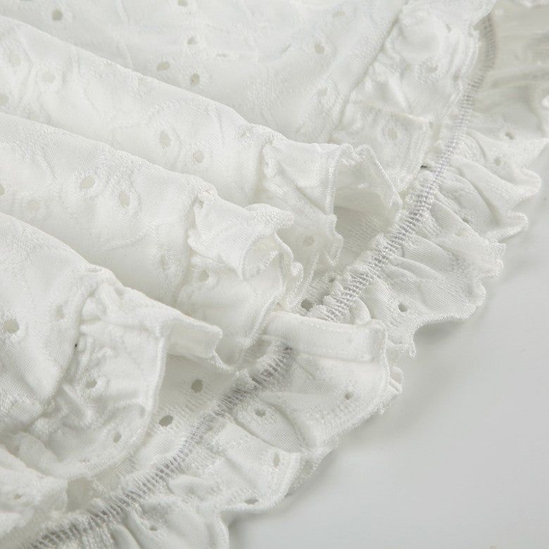 a punching eyelet bustier blouse