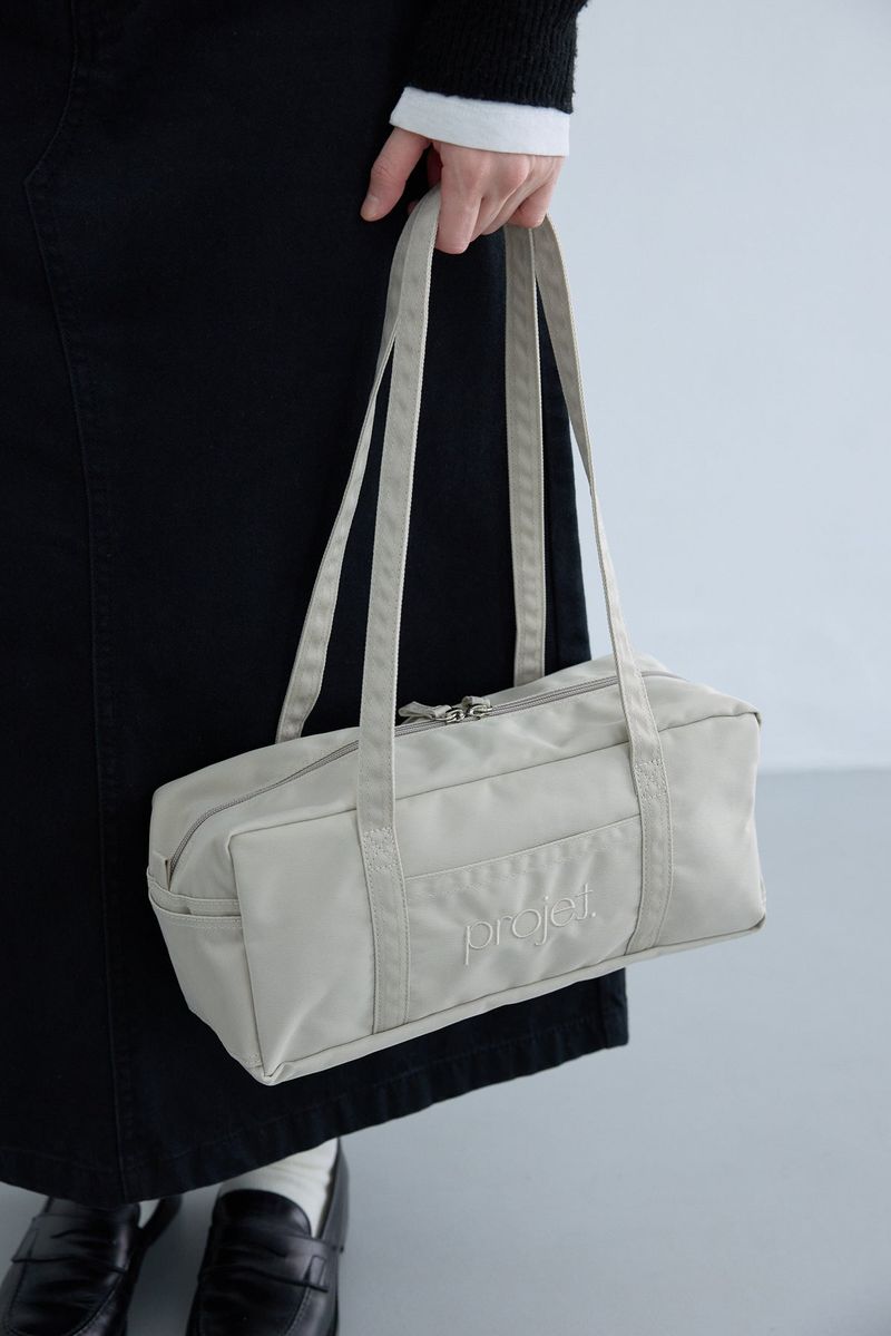compact duffle bag (light beige)