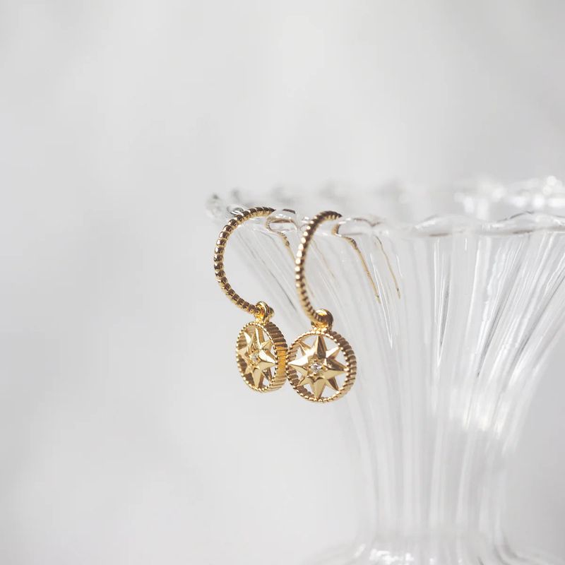 éclater（エクラテ）の「Corinne Starry Hoop Earrings（Accessories）」
