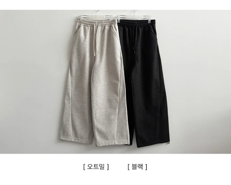 Mende Curved Incision Woolen Wide Pants