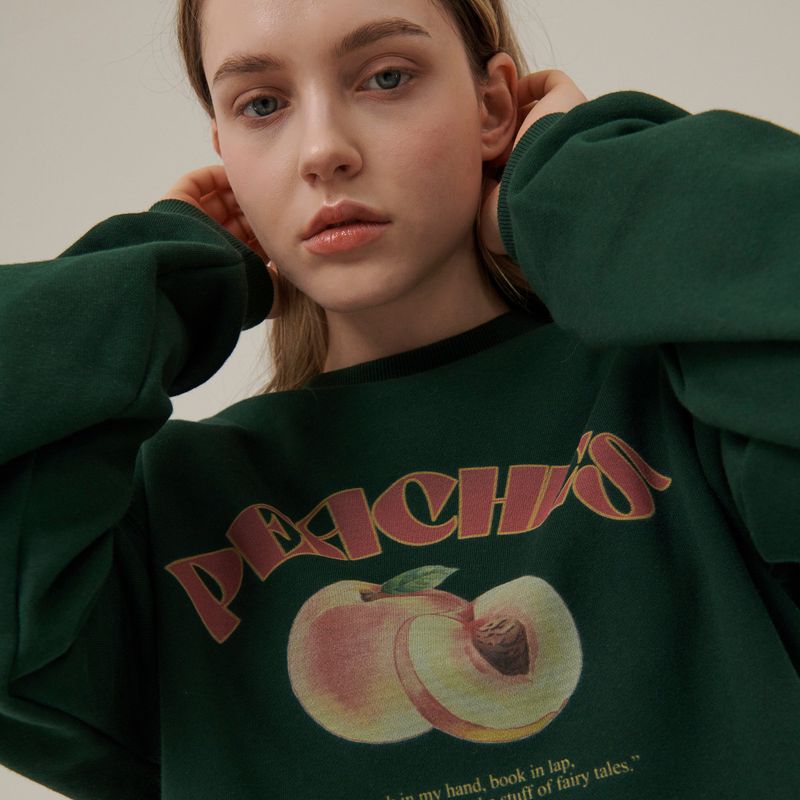 Between A and B(ビットウィーンエーアンドビー)の「PEACHES DRAWING SWEATSHIRT_DEEP GREEN(Tops)」