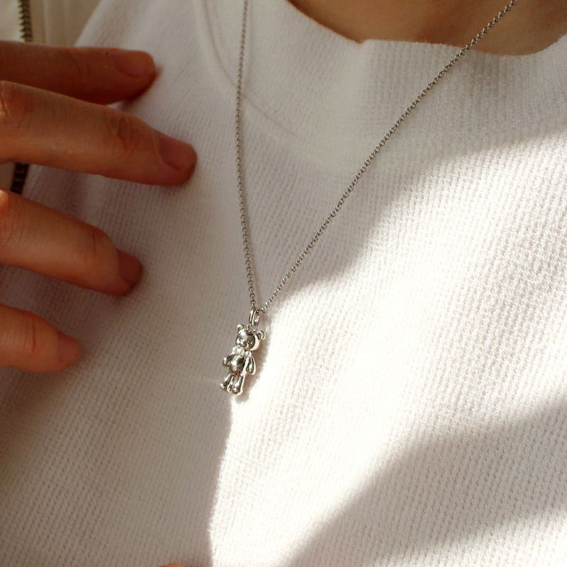noonoobear with pearl necklace