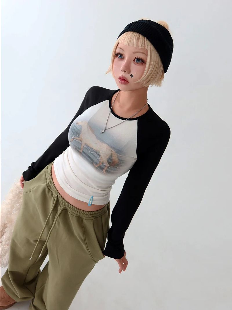 Delight-J（ディライトジェイ）の「ユニコーンフリースライニングラグランTシャツ（トップス）」