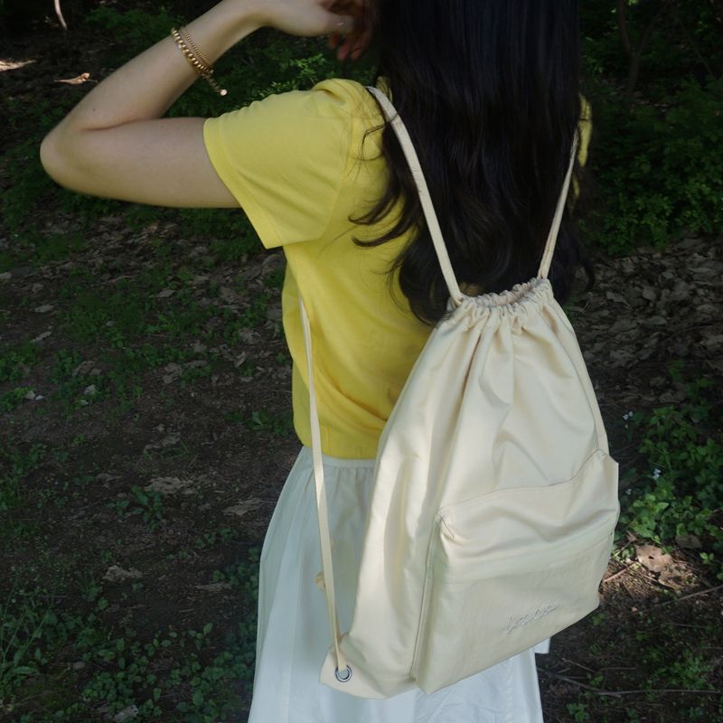 logo nylon string backpack_yellow