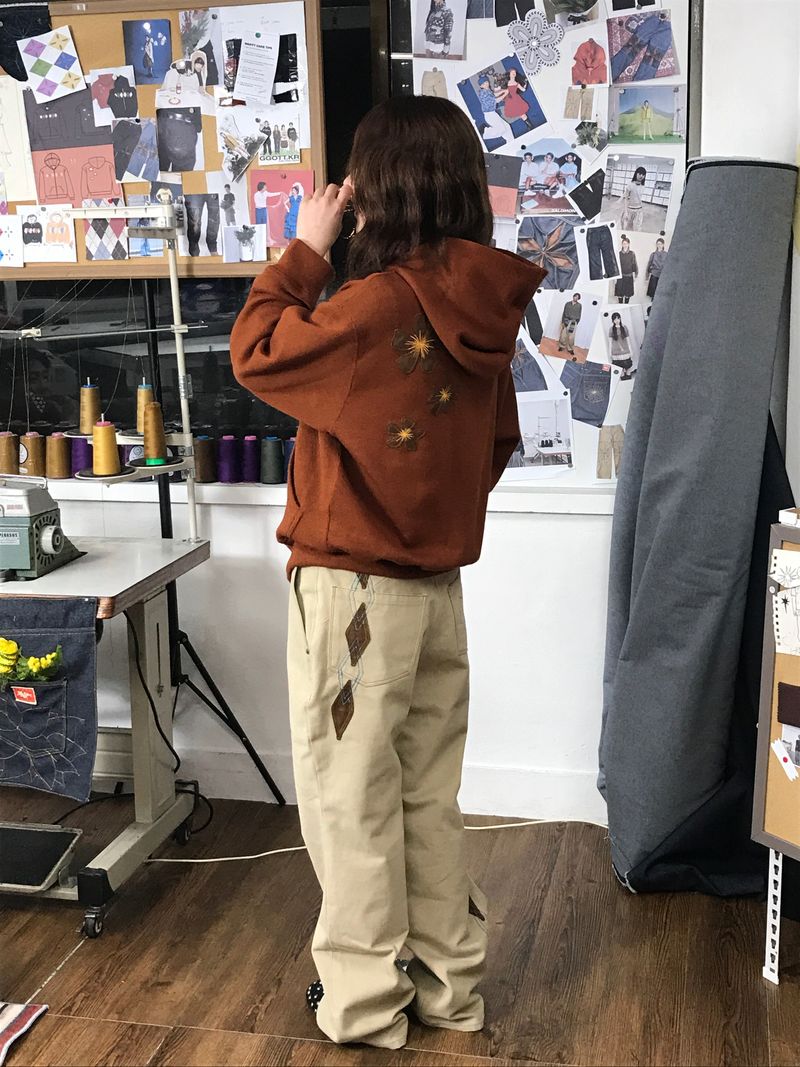 GGOTT（ゴット）の「[Hand-Made「006」] アーガイルパッチパンツ_ベージュ＆ブラウン（パンツ）」