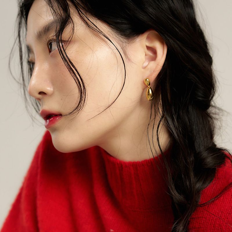 geegee(ジジ)の「double tear earring - gold(Accessories)」