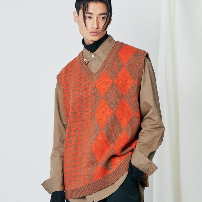 S SY（エスエスワイ）の「Argyle & hound check knit vest orange（Tops）」