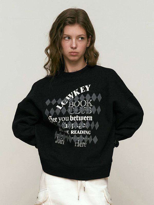 KIRSH（キルシー）の「LOWKEY BOOK CLUB ARGYLE PATTERN SWEATSHIRT [BLACK]（Tops）」