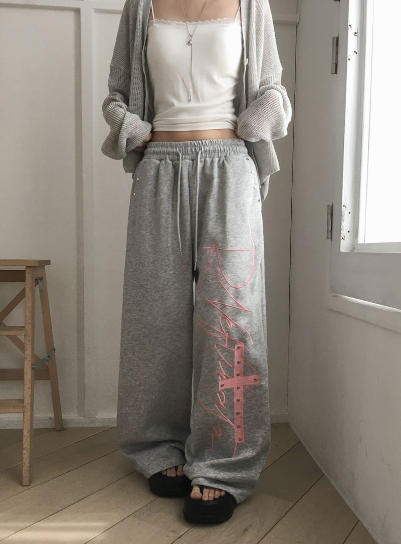 unbutty（アンバティ）の「ピンク クロス バンディング ロング パンツ（パンツ）」