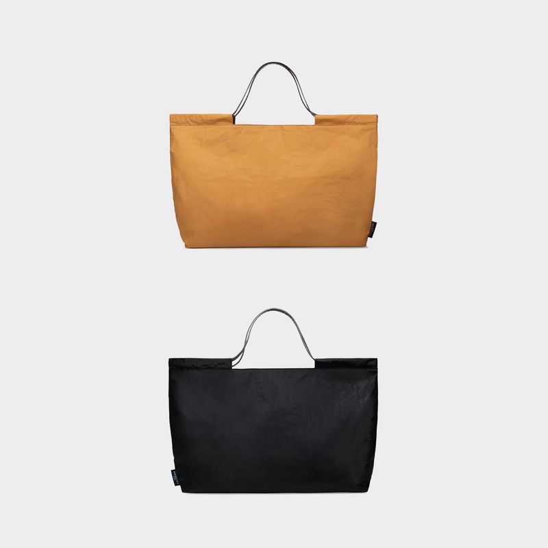 BASKISS（バスキス）の「TYVEK FLEXIBLE BAG - Golden Yellow & Black (LARGE)（Bags）」