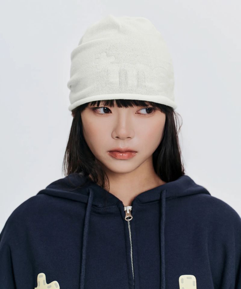 mahagrid（マハグリッド）の「mahロゴ ロール ビーニー アイボリー（帽子）」