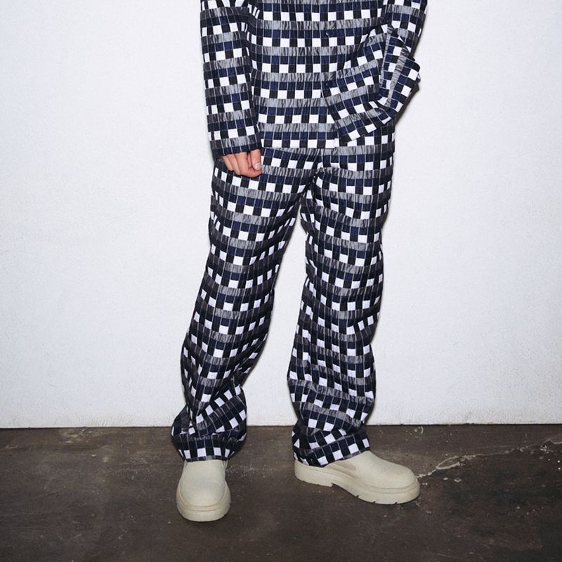 F8KE CHEMICAL CLUB（フェイクケミカルクラブ）の「NAVY CHECKERED BAGGY PANTS（Pants）」
