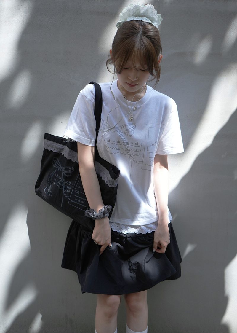 adorntie（アドオンタイ）の「Bow sound Lace T-shirts (white)（Tops）」