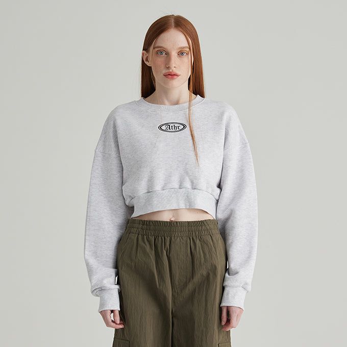 ANDTHEOTHER(アンドジアザー)の「WHITE ATHR CROP SWEATSHIRT(Tops)」