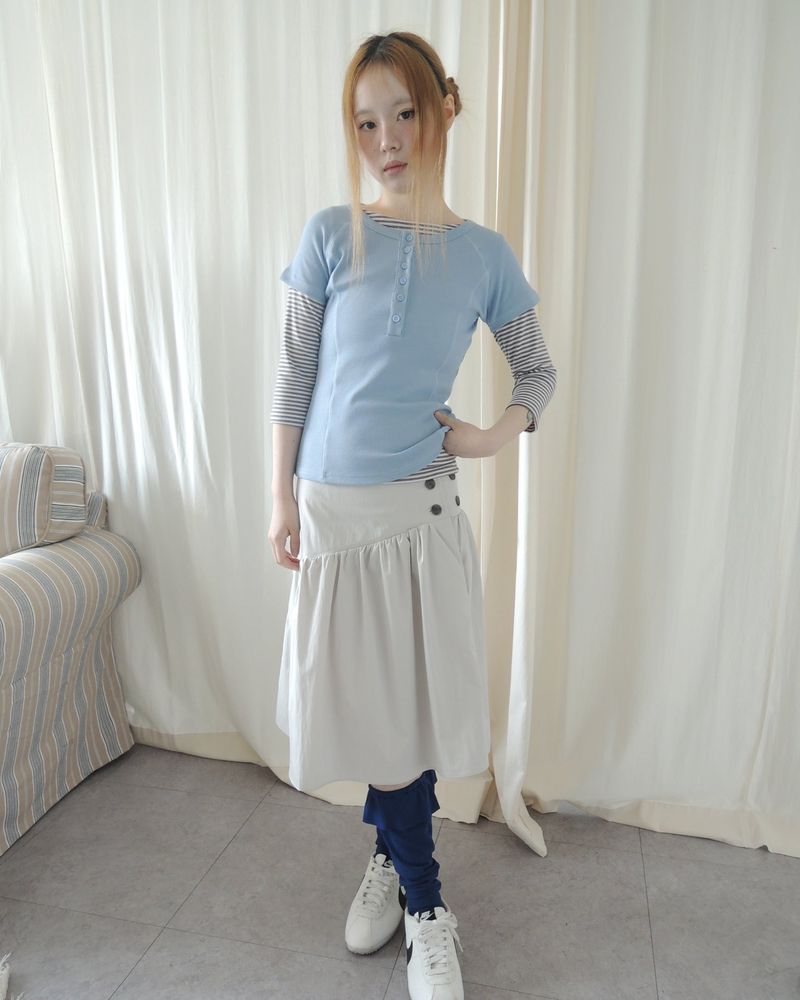 NUPHLO(ニューフロー)の「SLOW BUTTON FLARE MIDI SKIRT(Skirts)」