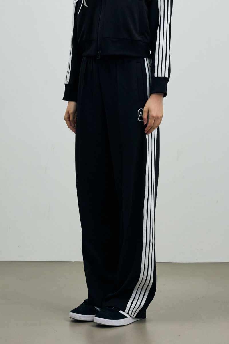 ARIKIM（アリキム）の「RIBBON JERSEY TRACK PANTS / BLACK（Pants）」