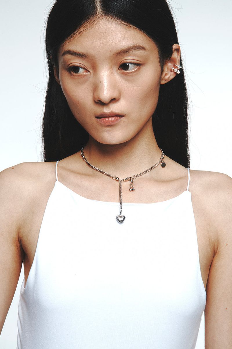 HEART PIERCING NECKLACE