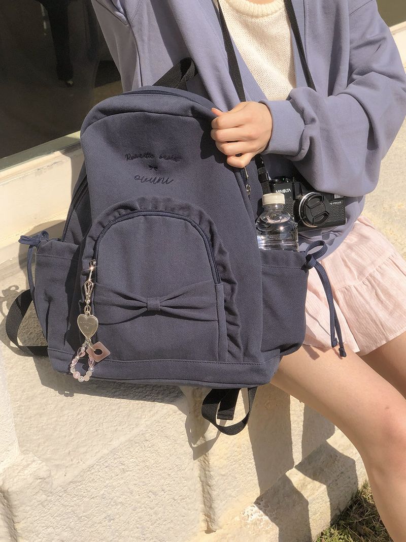 ovuni（オーブニ）の「Ruffle ribbon backpack_vintage navy（Bags）」