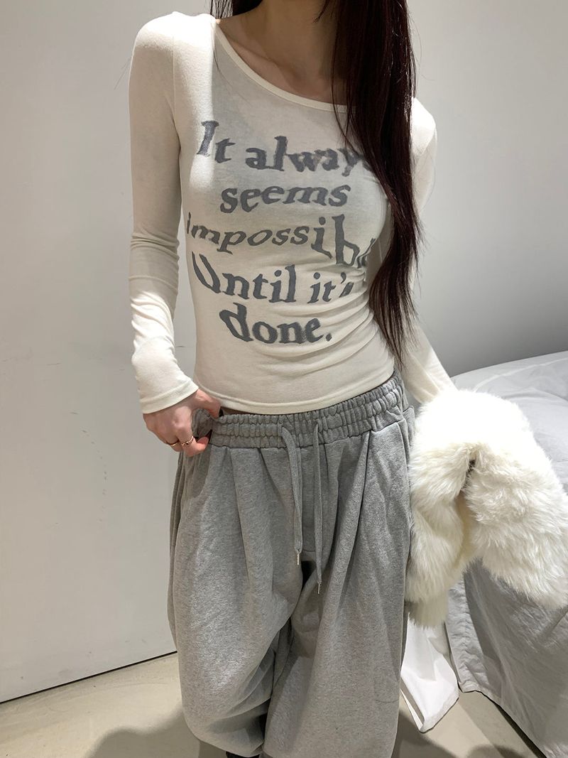 MUZESEOUL(ミューズソウル)の「Lettering slim long sleeve top(4color)(Tops)」