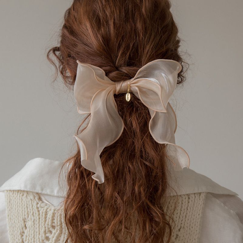 MerryMotive(メリーモチーブ)の「Salmon organza ruffle ribbon hairpin(Hair Accessories)」