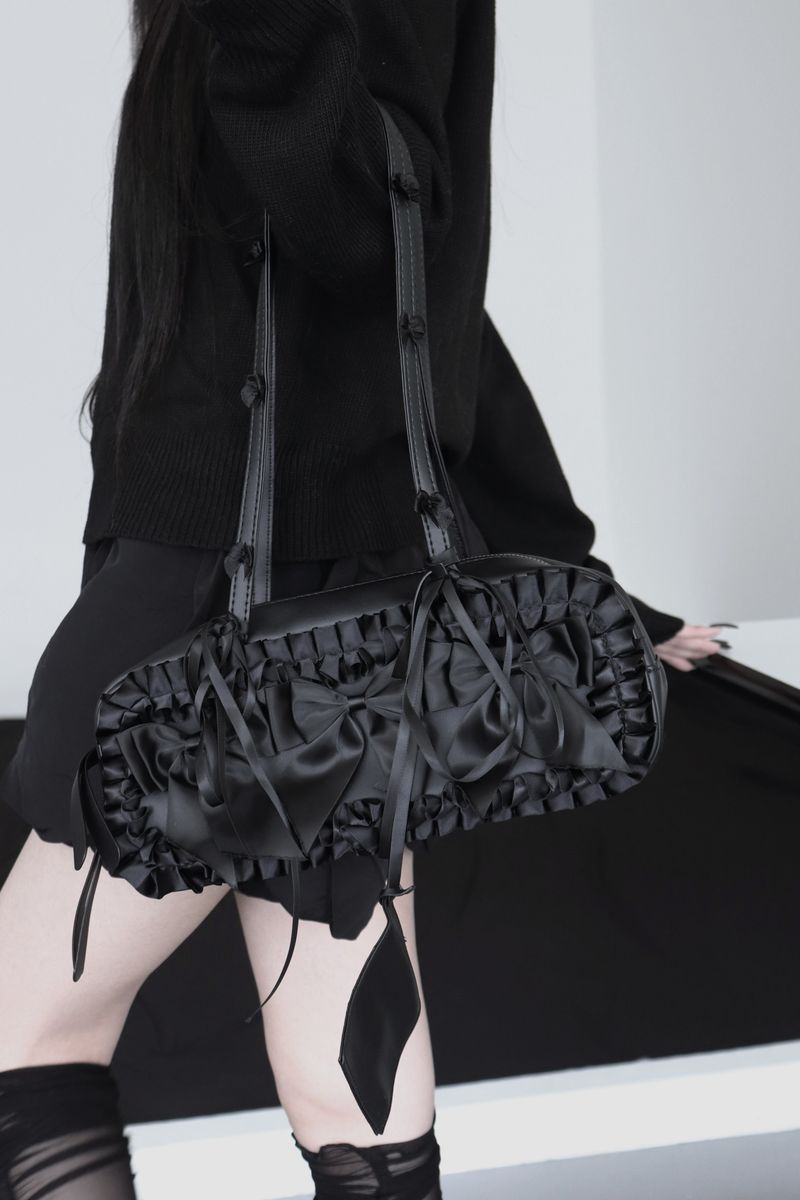 black leather ribbon bag