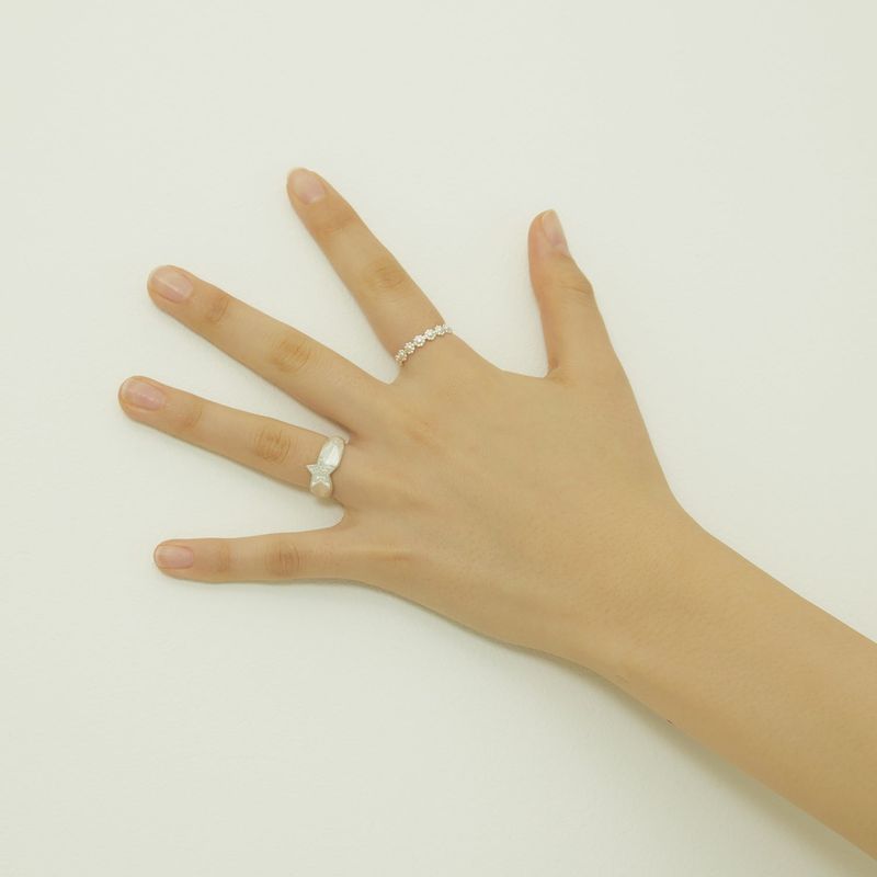 mini twin star ring gloss texture.