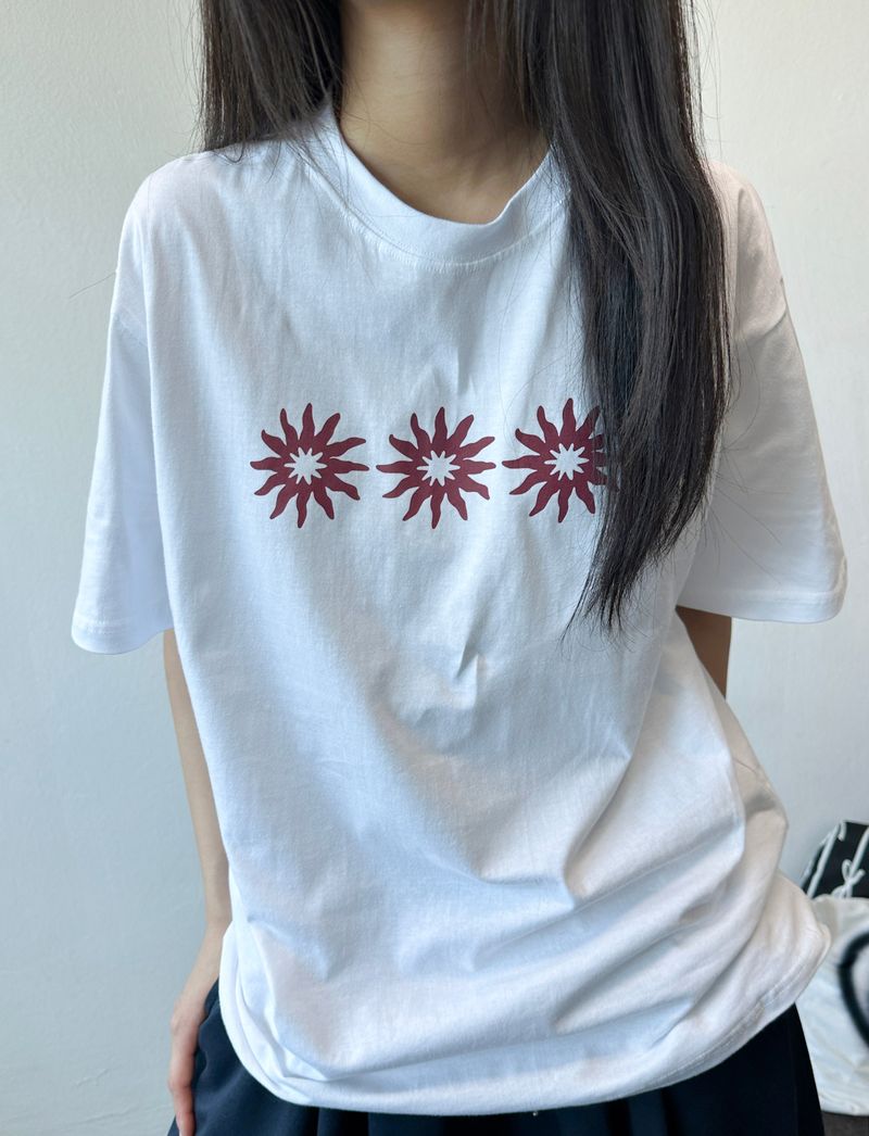 CCORTTI(コルッティ)の「Three Sun Tattoo Lettering Oversized T-Shirt 3color(Tops)」