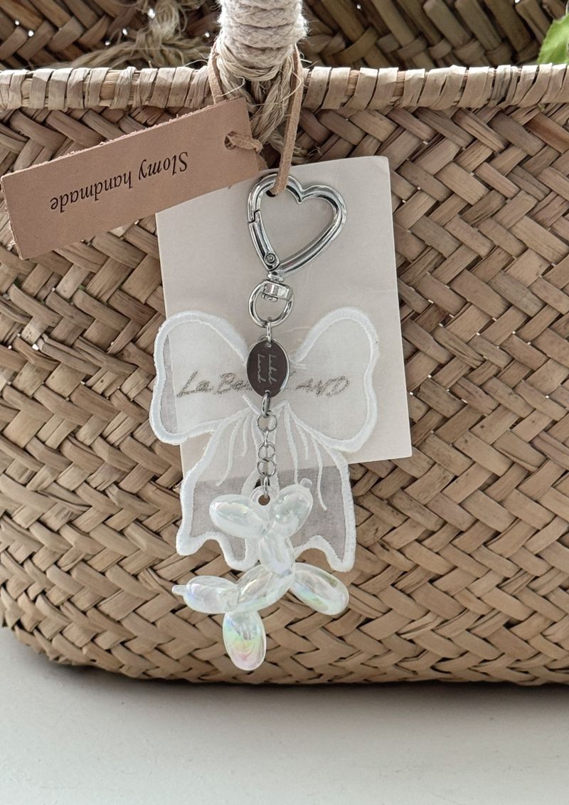LabelLand(ラベルランド)の「リボンバブリーキーリング (WHITE)(アクセサリー)」
