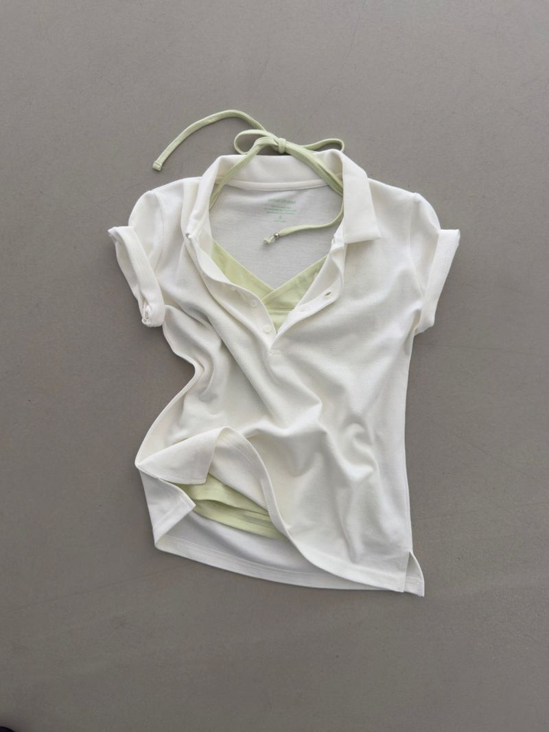 portraitseoul（ポートレイソウル）の「ダンシングオーキッド スタンダード スリムフィット PK Tシャツ (ivory) 2サイズ（トップス）」