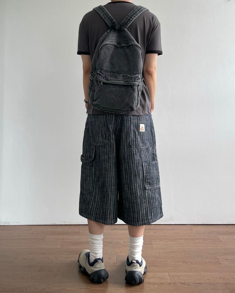 Washed denim backpack