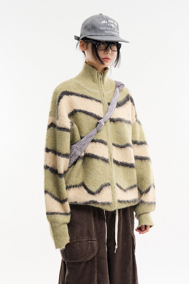 Raucohouse（ラウコハウス）の「Wavy color block wool zip-up knit（Tops）」