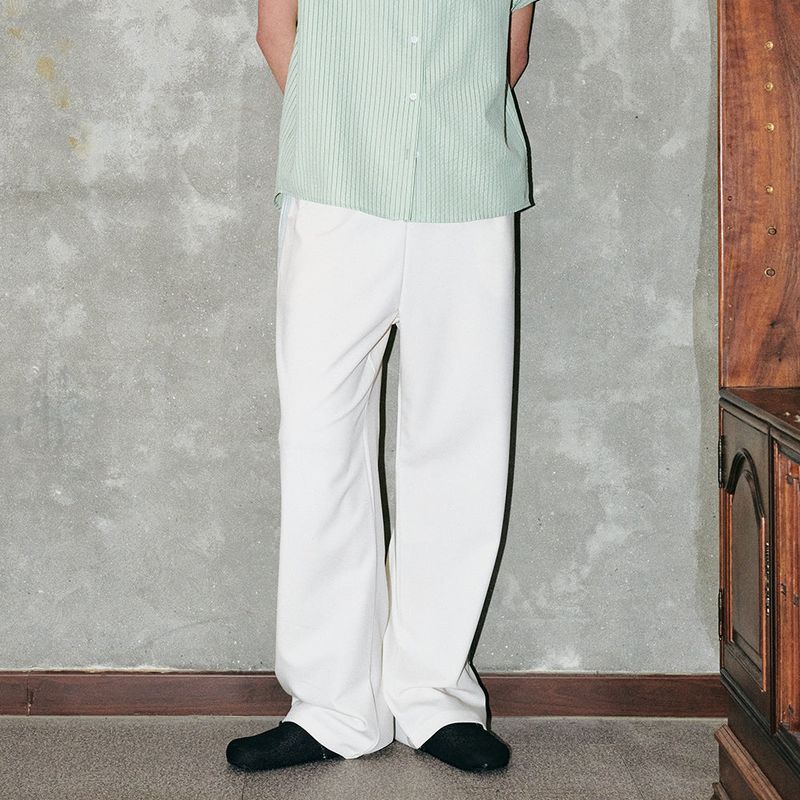CORCA（コルカ）の「Banding Track Pants Ivory（Pants）」