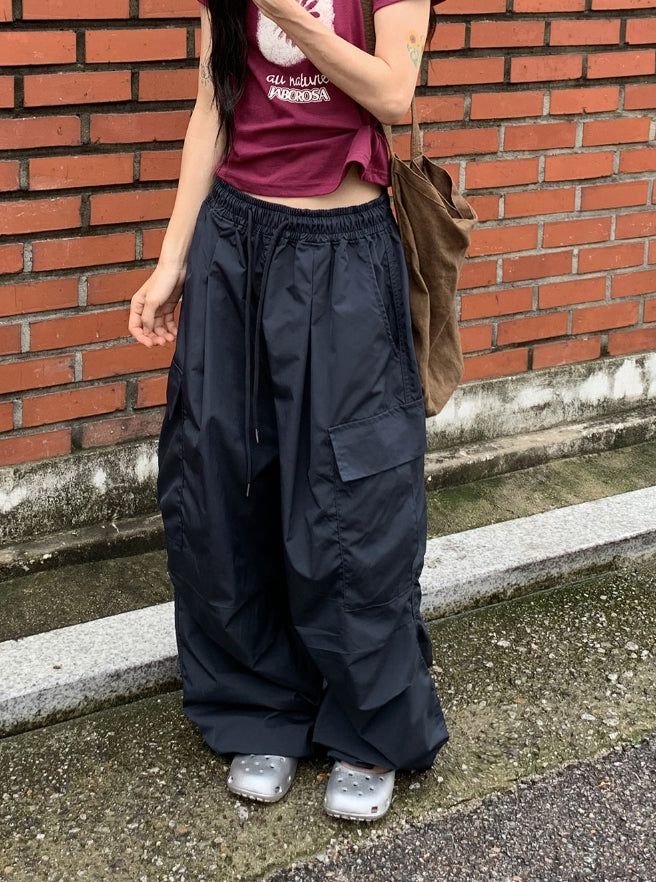 BAON（バオン）の「[unisex] Bene Nylon Cargo Parachute Banding Wide Pants（Pants）」