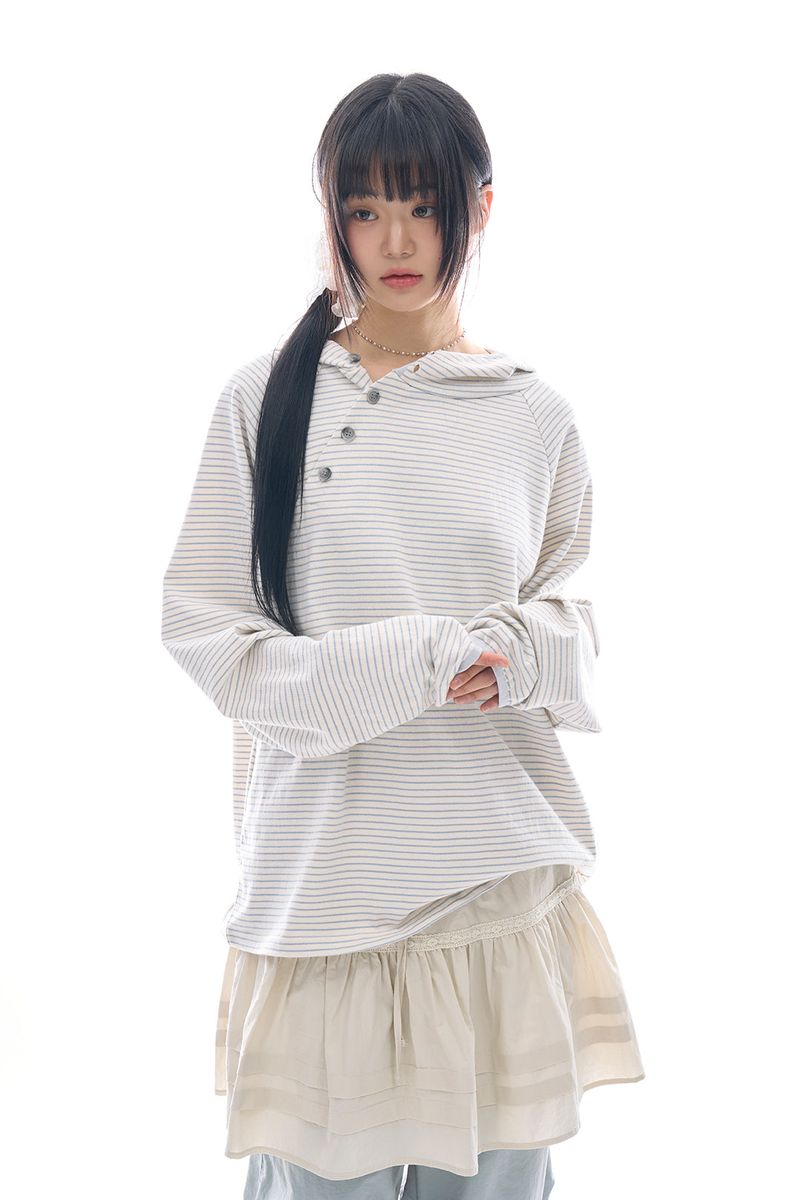 Raucohouse(ラウコハウス)の「Asymmetric button raglan hoodie(Tops)」